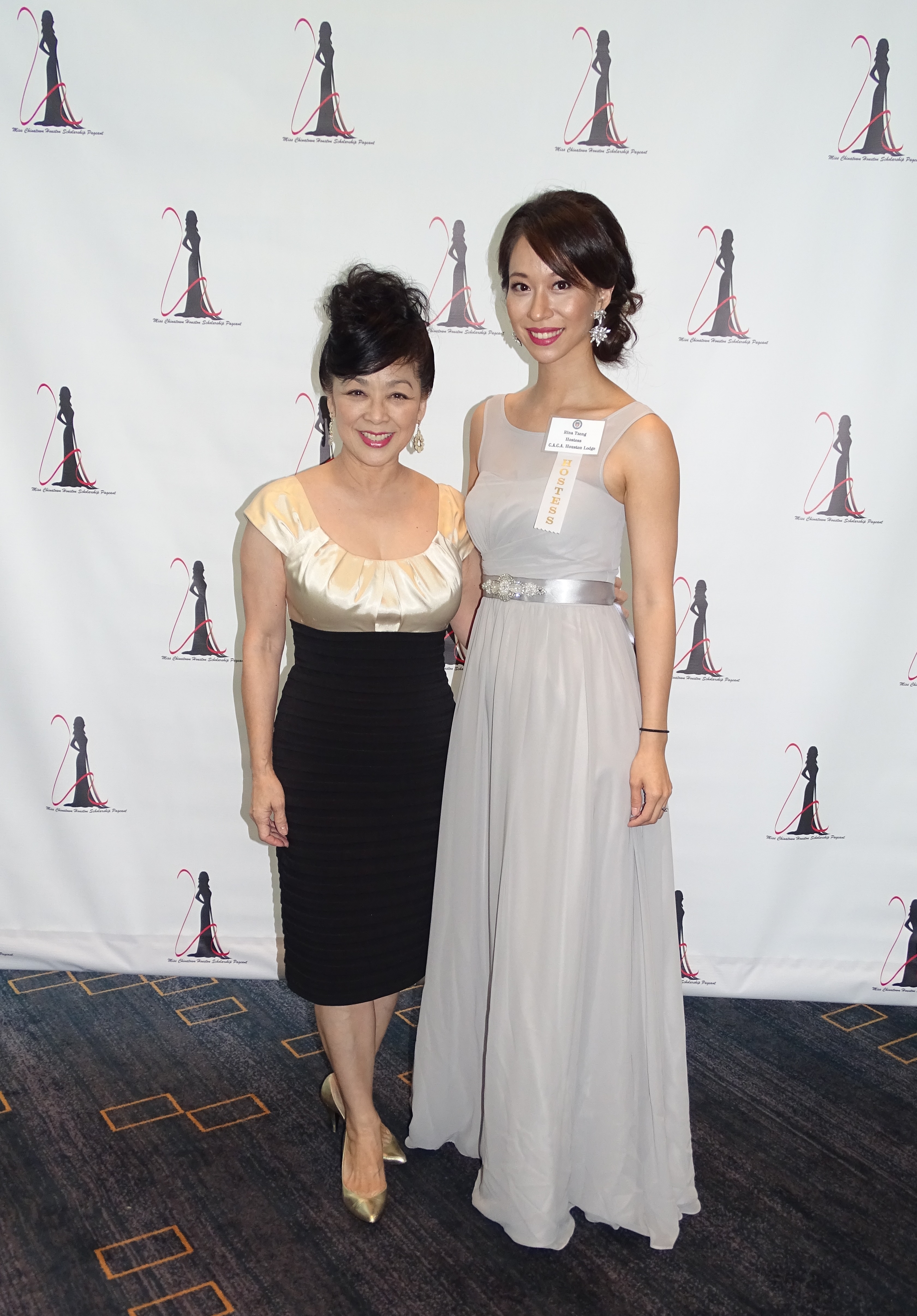 Asian American Ambassadors, Soo Leong Liu and Rina Liou, model their up-do's by William Chow of Susan Hair Styling at the 2016 Miss Chinatown Houston Scholarship Pageant.